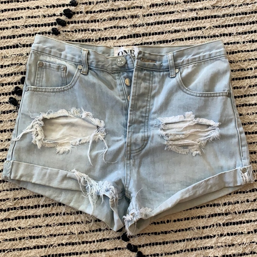 Loose fit One Teaspoon button fly short. The perfect summer denim staple!